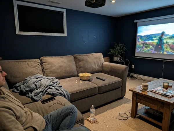 Orleans basement media room with blackout blinds closed