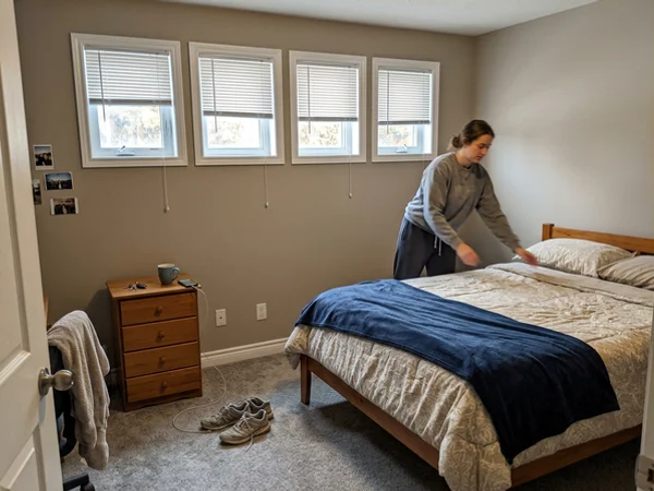 Matching mini blinds in a Stittsville basement suite bedroom
