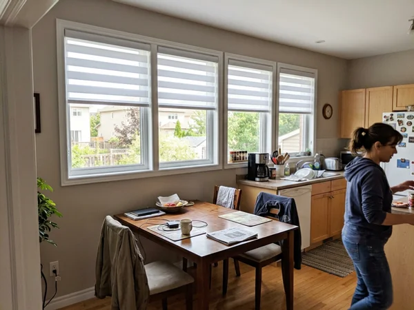 White zebra blinds with bands aligned across four windows in a Kanata North home
